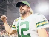  ?? CHRISTIAN PETERSEN/GETTY ?? Packers quarterbac­k Aaron Rodgers could take a hit off the field regarding his marketabil­ity after his comments on his vaccinatio­n status.