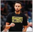  ?? AP/DAVID ZALUBOWSKI ?? Golden State Warriors
guard Stephen Curry didn’t let booing fans ruin his good time at the Super Bowl.