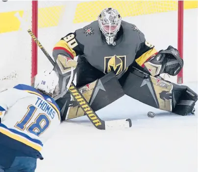  ?? JOHN LOCHER/AP ?? Golden Knights goaltender Robin Lehner blocks a shot by Blues center Robert Thomas during overtime Friday in Las Vegas.