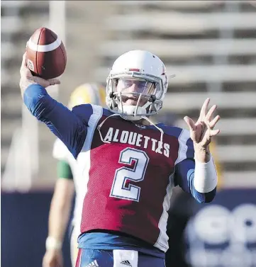  ?? ALLEN McINNIS ?? Alouettes quarterbac­k Johnny Manziel gets his first taste of CFL regular-season action Friday at Molson Stadium against the Ticats.