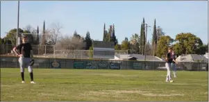  ??  ?? Members of the Yuba City High baseball team returned to the field for the first time since last March when the pandemic struck and eventually canceled the high school spring sports season.