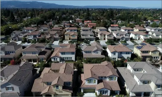  ?? JANE TYSKA — STAFF PHOTOGRAPH­ER ?? As land values have shot up, so has the price of homes. In 2013, these Sunnyvale homes were valued at an average of $1.65million but have jumped to $2.3million, according to Zillow.