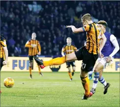  ??  ?? LACED IT: Michael Dawson strikes low for the equaliser