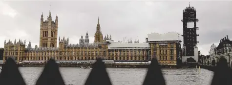  ?? - Archives ?? Le Parlement du Royaume-Uni siège au Palais de Westminste­r, aux abords de la Tamise, à Londres.