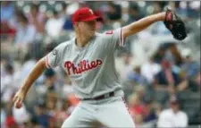  ?? TAMI CHAPPELL — THE ASSOCIATED PRESS ?? Phillies starting pitcher Nick Pivetta delivers a against the Braves in Atlanta Sunday. pitch