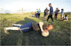  ??  ?? ‘This team keeps us physically and mentally fit,’ says Tigers FC player Siphamandl­a Tyebileyo, 28, from Lloyd, an informal settlement in Philippi.