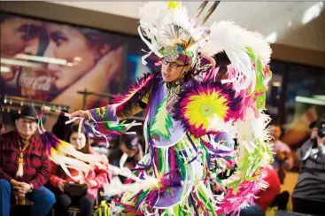  ?? Herald photo by Ian Martens ?? Kyle Young Pine performs the Fancy Dance style during a powwow as part of Native Awareness Week Monday in the atrium at the University of Lethbridge. @IMartensHe­rald