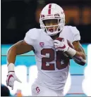  ?? ELAINE THOMPSON — THE ASSOCIATED PRESS ?? Stanford’s Austin Jones ran for a careerhigh 138yards and two TDs vs. Washington.