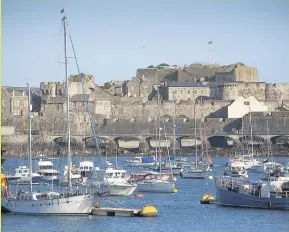  ??  ?? PICTURESQU­E The Guernsey capital St Peter Port's scenic harbour is a beautiful spot