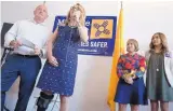  ?? ADOLPHE PIERRE-LOUIS/JOURNAL ?? Retired astronaut Mark Kelly and his wife, former U.S. Rep. Gabby Giffords, speak in favor of new gun laws. Behind them are Democratic gubernator­ial candidate Michelle Lujan Grisham and Miranda Lovato, who survived the Las Vegas, Nev., concert shooting.