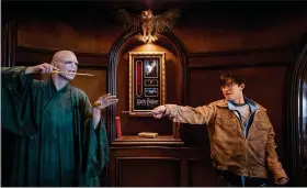  ?? SARAH REINGEWIRT­Z — SOUTHERN CALIFORNIA NEWS GROUP ?? Figures of Voldemort and Harry Potter square off in the Shands’ home, a shrine to Hollywood horror.