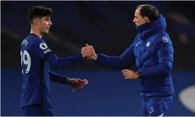  ??  ?? The Chelsea manager Thomas Tuchel (right) celebrates with Kai Havertz after the 21year-old forward impressed in the 2-0 win against their top-four rivals Everton. Photograph: Glyn Kirk/EPA