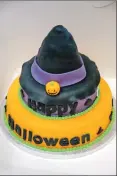  ?? 06_ a44Co- opcharity0­2 ?? One of the raffle prizes was this fantastic Hallowe’en cake, left, made by Denise Galloway.