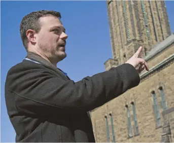  ?? - Archives ?? Romain Blanchard, un des responsabl­es du projet Place de la cathédrale, pose devant l’édifice du centre-ville de Moncton.