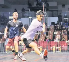  ?? Squash Open. — Bernama file photo ?? Eain Yow (right) plays against Leandro Romiglio from Argentina during the Malaysia