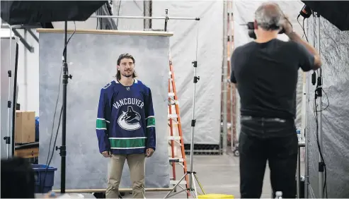  ?? — THE CANADIAN PRESS ?? The Canucks have the same players on the blue-line as they did last year, including Chris Tanev, above. However, coach Travis Green is hoping to cultivate a more uptempo style of play from the defence.