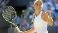  ?? – Reuters ?? BACK FROM THE BRINK: Denmark’s Caroline Wozniacki is all smiles after defeating Estonia’s Anett Kontaveit in the third round of Wimbledon Championsh­ips in London on Saturday.