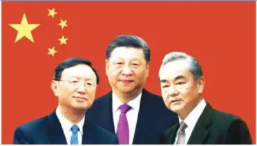  ?? ?? China's top two diplomats, Yang Jiechi (left) and Wang Yi (right), with President Xi Jinping © Nikkei montage/Source photos by Getty Images, Reuters