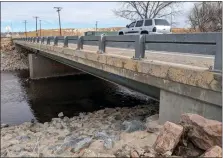  ?? JOHNNIE ST. VRAIN — LONGMONT TIMES-CALL ?? The riprap — large rocks — along the base of the 119th Street bridge over the St. Vrain River in southeast Longmont has been cemented into place. Photo taken Feb. 9.