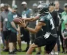 ?? THE ASSOCIATED PRESS ?? Receiver Mack Hollins got a chance to get reps with QB Carson Wentz with first-choice options Alshon Jeffery and Torrey Smith sitting out on Tuesday.
