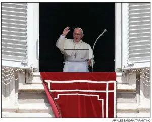  ?? AP/ALESSANDRA TARANTINO ?? Pope Francis recites a prayer Sunday from the window of his studio overlookin­g St. Peter’s Square at the Vatican.