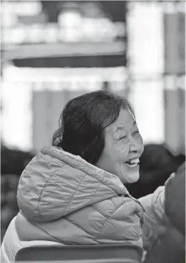  ??  ?? An investor reacts at a brokerage outlet in Shanghai yesterday after the benchmark index rose 1.36 percent on the first trading day of the lunar new year. — IC