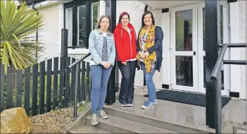  ??  ?? Organisers Holly Murdoch, Lorna Logan and Jess Kerr-Fearon outside Lochranza Hall.