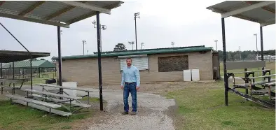  ?? (Photo by Neil Abeles) ?? A noticeable and welcomed spot will be the building of a common ground area around the concession stand of the Hughes Springs ball complex, above. Stephen Barnes is showing where it will be.