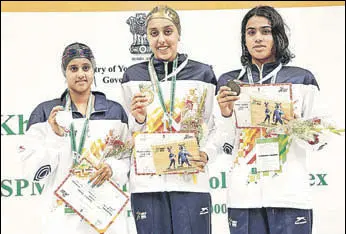  ?? HT PHOTO ?? Karnataka swimmer Suvana Baskar (left) with the 200m medley silver. She won three medals, including gold in 200m backstroke, at the Khelo India School Games.