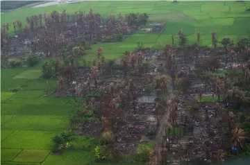  ??  ?? File photo shows an aerial view of burnt villages near Maungdaw in Myanmar’s northern Rakhine state. — AFP photo