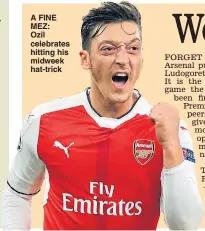  ??  ?? A FINE MEZ: Ozil celebrates hitting his midweek hat-trick