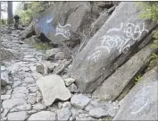  ?? Yosemite National Park ?? OFFICIALS are seeking help in finding the vandals who tagged 30 locations at Yosemite National Park.