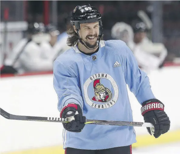  ??  ?? Senators captain Erik Karlsson has yet to play this season as he recovers from off-season foot surgery, but that could change on Tuesday when the Canucks are in Ottawa. Head coach Guy Boucher said a return could also come later in the week. — TONY...