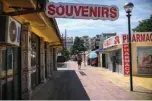  ??  ?? File photo shows an empty street with closed stores in Sunny Beach, Bulgaria’s biggest Black Sea resort.