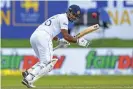  ?? ?? Sri Lanka’s captain, Dimuth Karunaratn­e, in action against West Indies. Photograph: Ishara S Kodikara/AFP/Getty Images