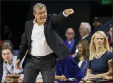  ?? ROBERT FRANKLIN — THE ASSOCIATED PRESS ?? Connecticu­t head coach Geno Auriemma directs players during the first half of an NCAA college basketball game Sunday in South Bend, Ind.