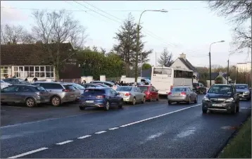  ??  ?? ABOVE: Busy traffic outside Clonroche NS. BELOW: some of the letters written by pupils.