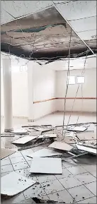  ?? (File pics) ?? The dilapidate­d ceiling is falling apart at the Shiselweni Magistrate­s Court in Nhlangano.