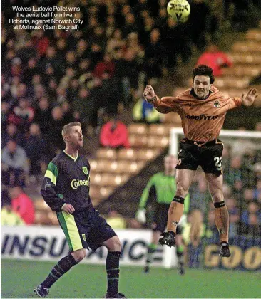  ?? ?? Wolves’ Ludovic Pollet wins the aerial ball from Iwan Roberts, against Norwich City at Molinuex (Sam Bagnall)
