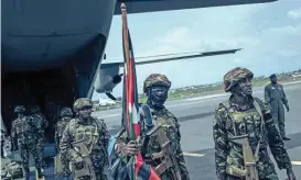  ?? (AFP) ?? Kenyan soldiers land in the city of Goma, eastern Democratic Republic of Congo on Saturday