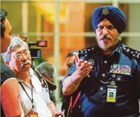  ??  ?? Federal police CCID director Datuk Seri Amar Singh at the Pavilion Residences in Kuala Lumpur on Thursday. PIC BY LUQMAN HAKIM ZUBIR