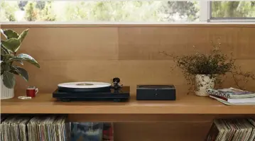  ??  ?? It’s easy to play your vinyl collection in one or more rooms by connecting your record player to the Sonos Amp. Sonos’ TrueplayTM tuning technology ensures that the sound is optimized no matter where the speaker is placed.