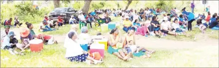  ?? (Courtesy pics) ?? Some of the residents of the Gilgal Constituen­cy listening to proceeding­s during Lisakhanya Likusasa GBV and Mental Health Awareness Campaign event held at Gilgal Sports Ground.