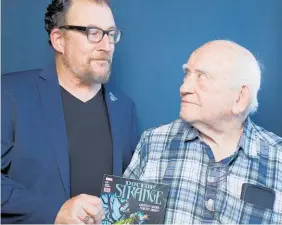  ?? Photo / AP ?? Ed Asner and his son Matthew are busy promoting their online comic art auction.