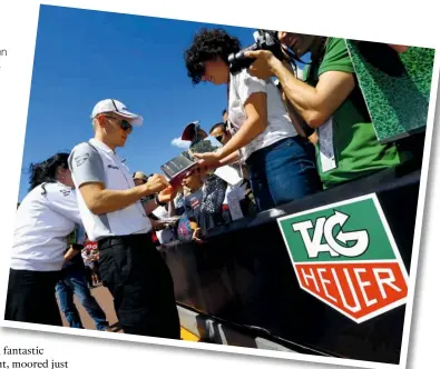  ??  ?? STAR SPOTT ED MAGNUSSEN SIGNS AUTOGRAPHS AT THE TRACK