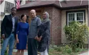  ?? — AP ?? Refugees from Somalia, Vietnam, Yemen, and Syria outside US President Donald Trump’s boyhood home in the Jamaica Estates neighborho­od of the Queens borough of New York.