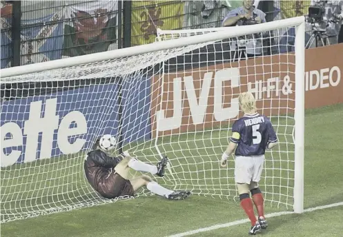  ??  ?? 0 Jim Leighton and Colin Hendry are unable to prevent Morocco’s second goal in a 3-0 defeat at the 1998 World Cup, the last time Scotland qualified for a major finals. Iain Mcmenemy believes a better system must be put in place to develop young players.