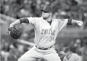  ?? Associated Press ?? Chicago Cubs starting pitcher Jon Lester (34) delivers during the first inning of a baseball game Saturday against the Miami Marlins in Miami.