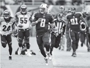  ??  ?? Tennessee Titans quarterbac­k Marcus Mariota runs the ball against the Cincinnati Bengals in the first half Sunday in Nashville. The Titans hope the performanc­e will carry over to the road Thursday against Pittsburgh.