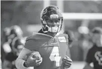  ?? JUSTIN REX/AP ?? Texans quarterbac­k Deshaun Watson’s football situation remains in limbo until his legal situation is resolved.